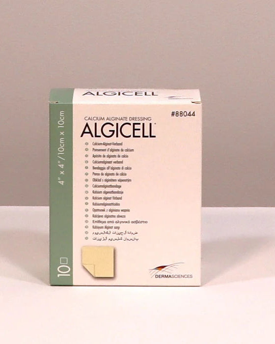 Box of Algicell calcium alginate dressing on a beige background