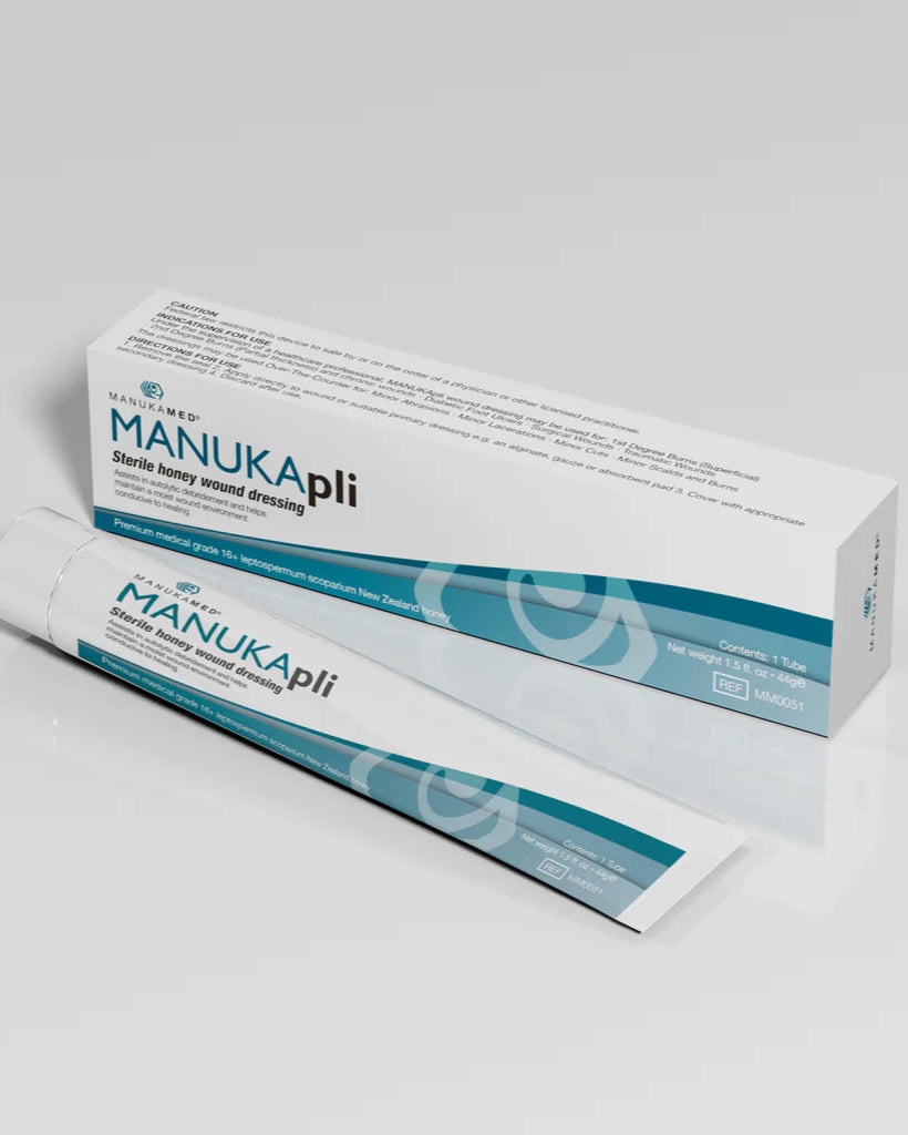 ManukaPli sterilized honey wound dressing packaging on a gray background