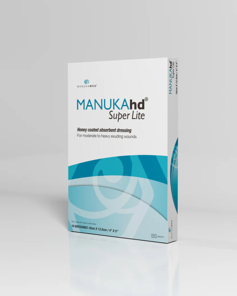 Box of Manuka Super Lite medical dressing on a gray background